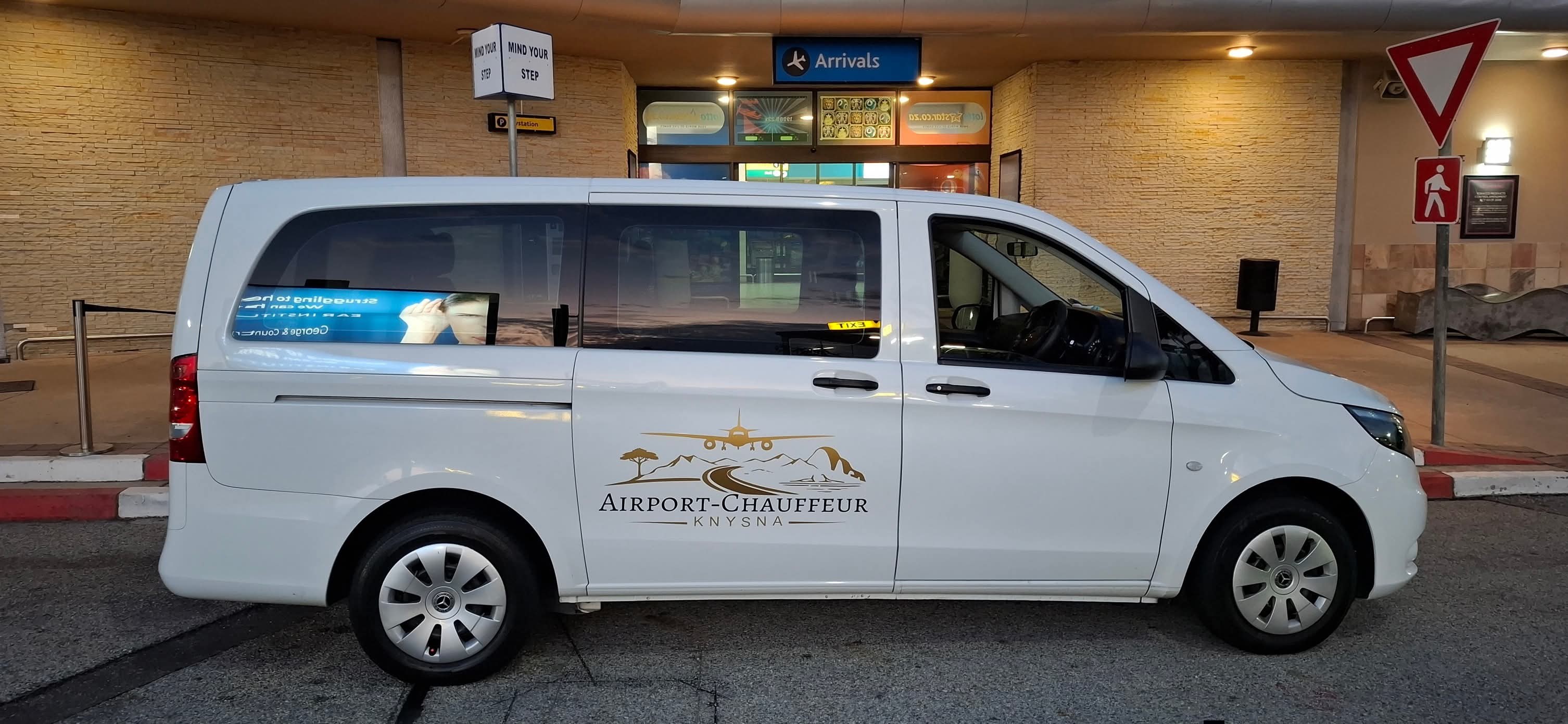 Airport-Chauffeur Knysna white Mercedes Vito at the airport arrivals terminal